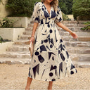 Isolde - Abito midi con scollo a V